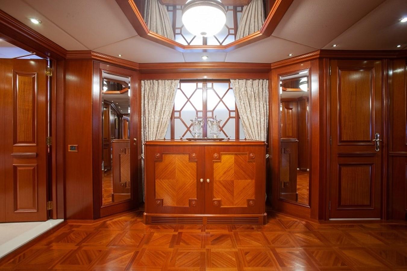 a room with wooden doors aboard BLUE STAR Yacht for Sale