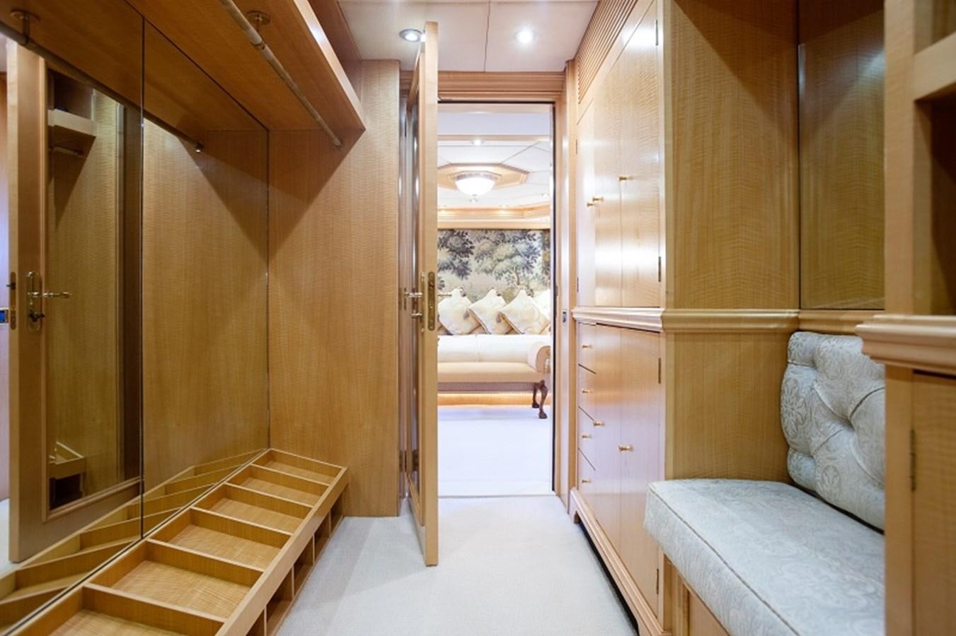 a room with a bed and a couch aboard BLUE STAR Yacht for Sale