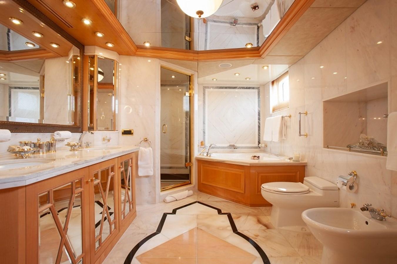 a bathroom with a large mirror aboard BLUE STAR Yacht for Sale