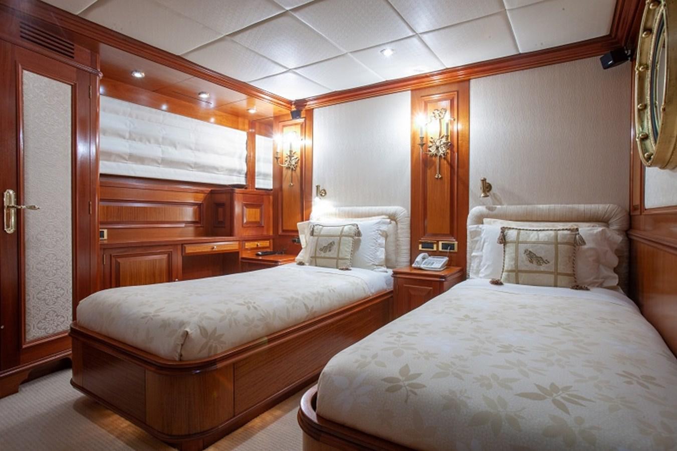 a couple of beds in a room aboard BLUE STAR Yacht for Sale