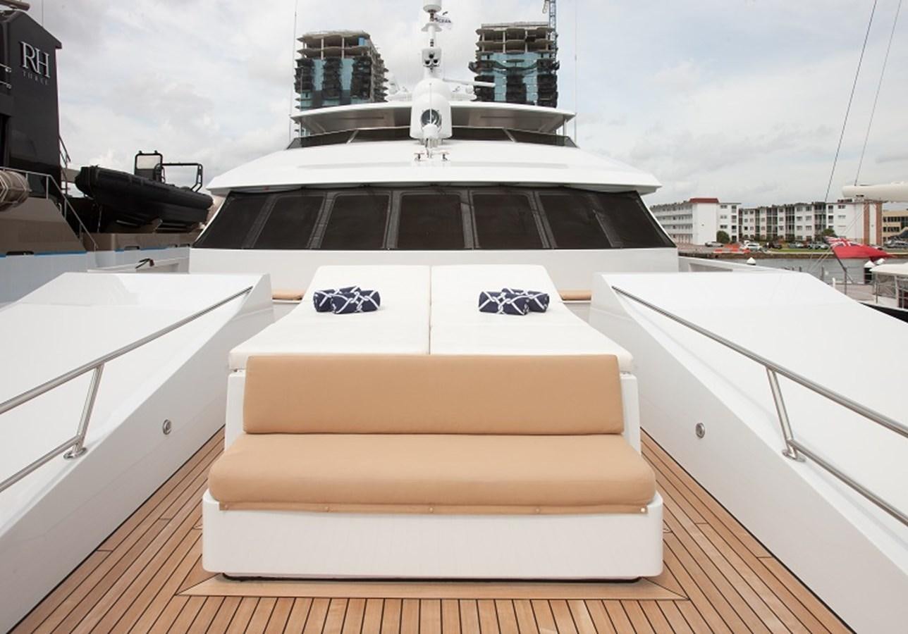 a white table with a black and white design on it aboard BLUE STAR Yacht for Sale