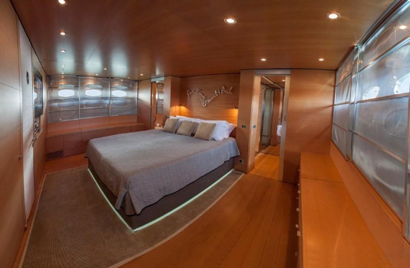 a bed in a room aboard NOT GUILTY III Yacht for Sale
