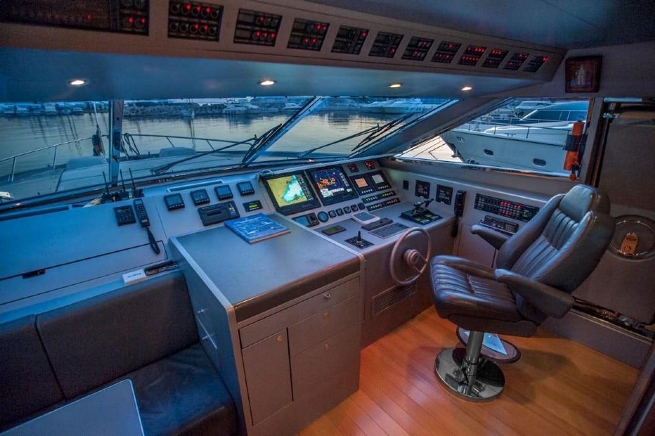 a room with a desk and chairs aboard NOT GUILTY III Yacht for Sale