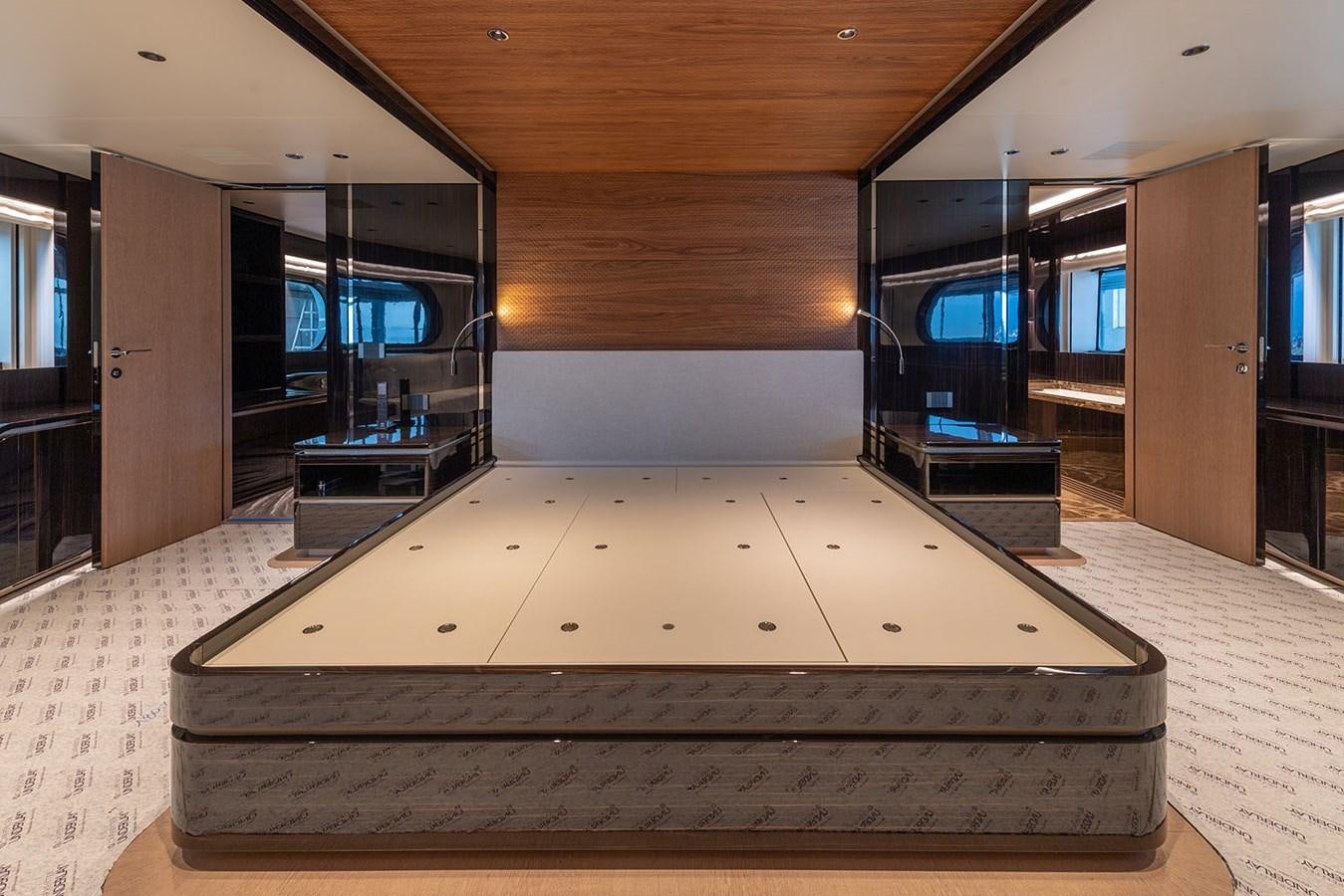 a large modern room with glass walls aboard BARON TRENCK Yacht for Sale