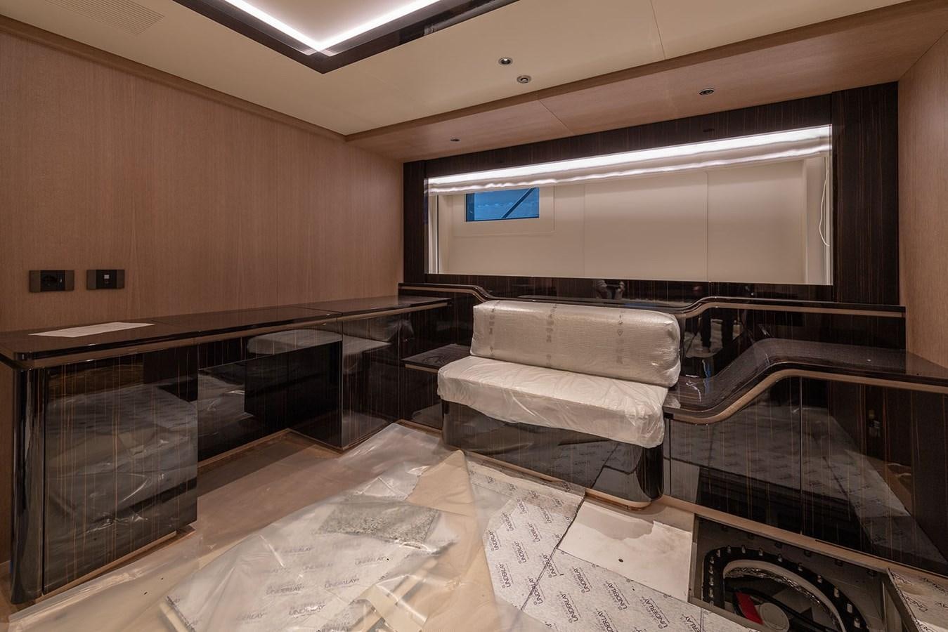 a room with a couch and a table aboard BARON TRENCK Yacht for Sale