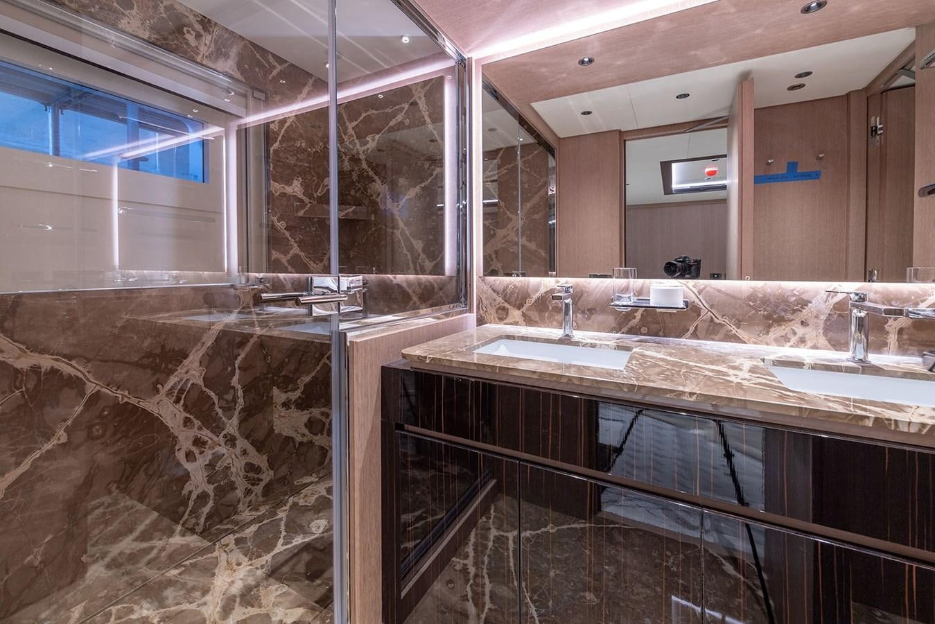 a bathroom with marble counters aboard BARON TRENCK Yacht for Sale