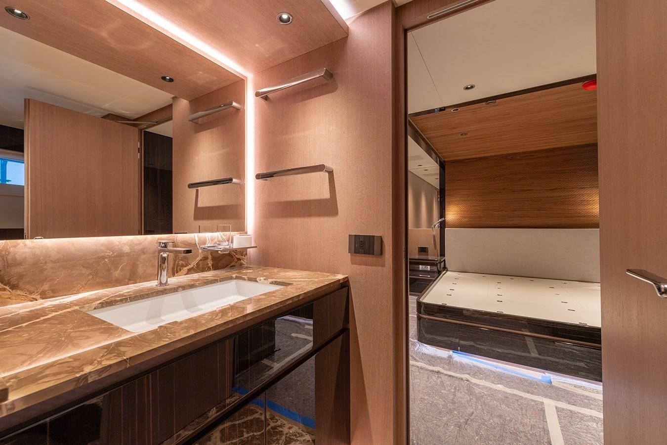 a bathroom with a large mirror aboard BARON TRENCK Yacht for Sale