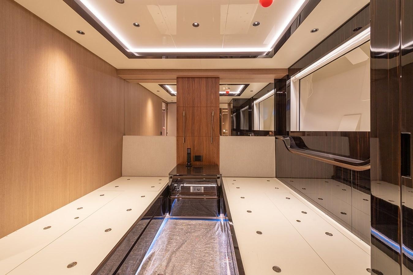 a long hallway with a tile floor aboard BARON TRENCK Yacht for Sale