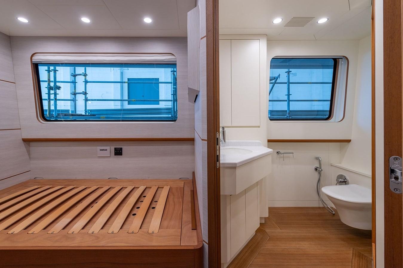 a bathroom with a large window aboard BARON TRENCK Yacht for Sale