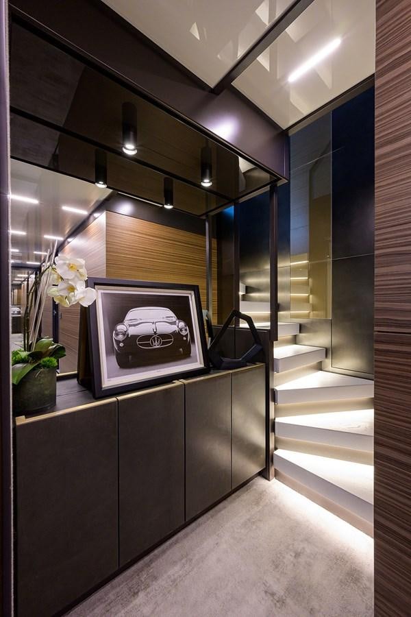 a room with a fireplace and a television aboard DATE NIGHT Yacht for Sale