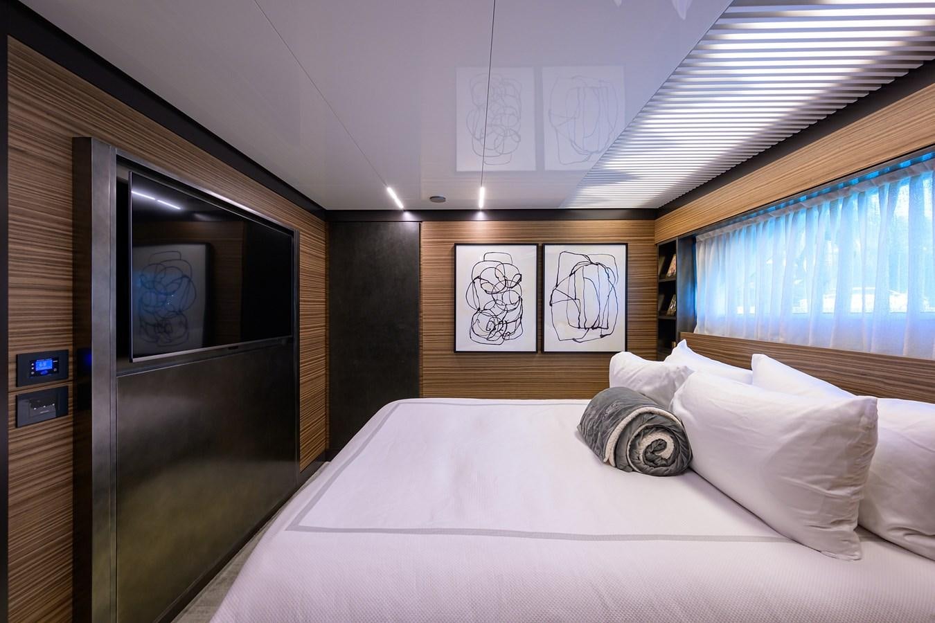 a bed in a room aboard DATE NIGHT Yacht for Sale