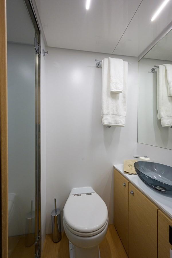 a bathroom with a sink toilet and a shower aboard DATE NIGHT Yacht for Sale