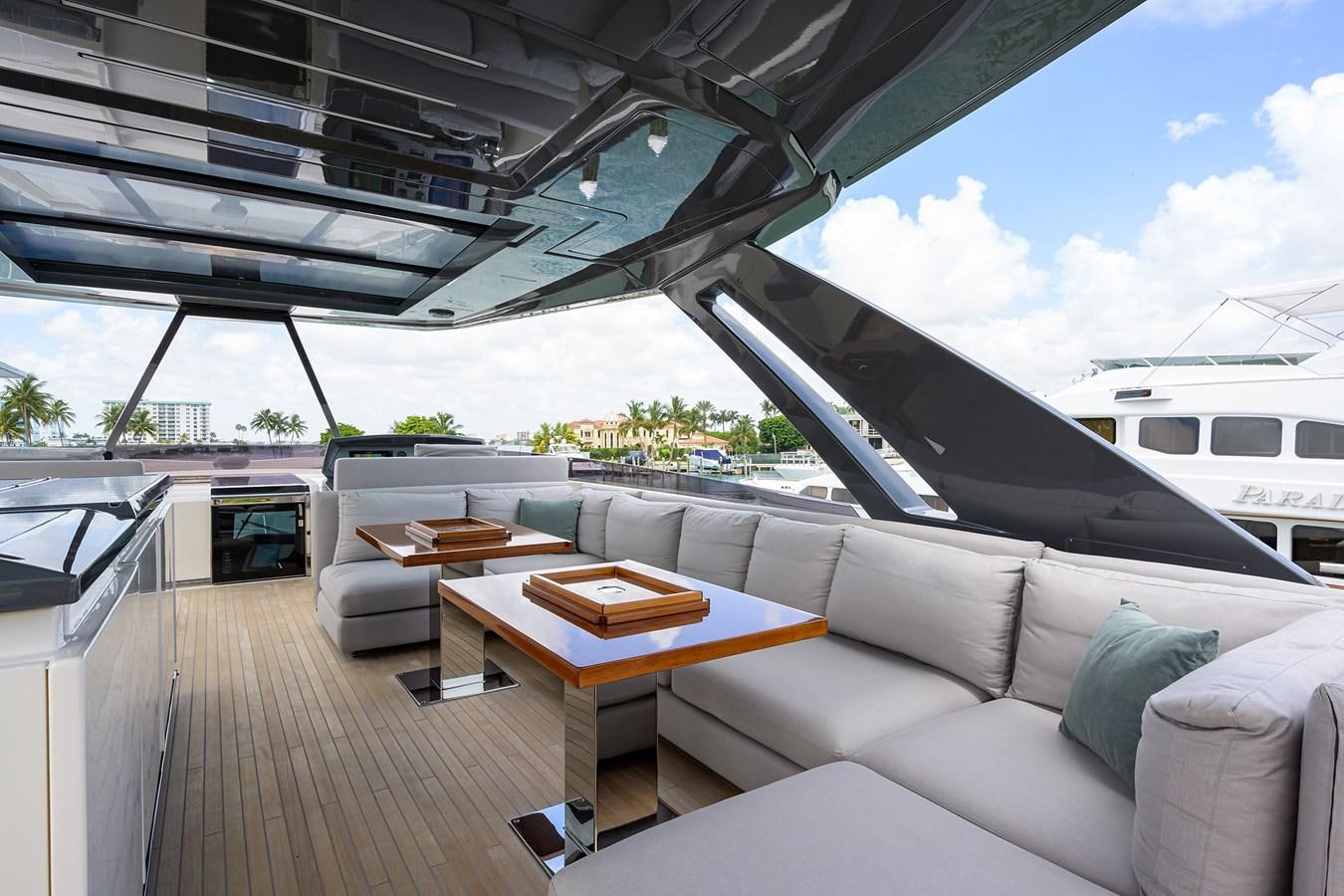 a living room with a couch and a table aboard DATE NIGHT Yacht for Sale