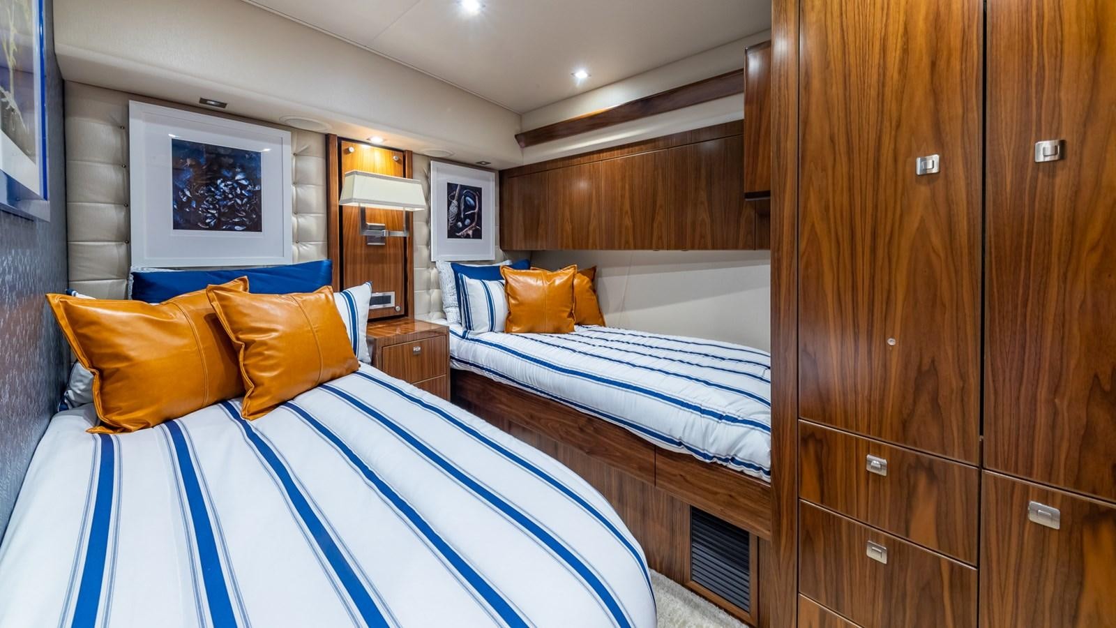 a room with a couple of beds aboard AUSSIE RULES Yacht for Sale