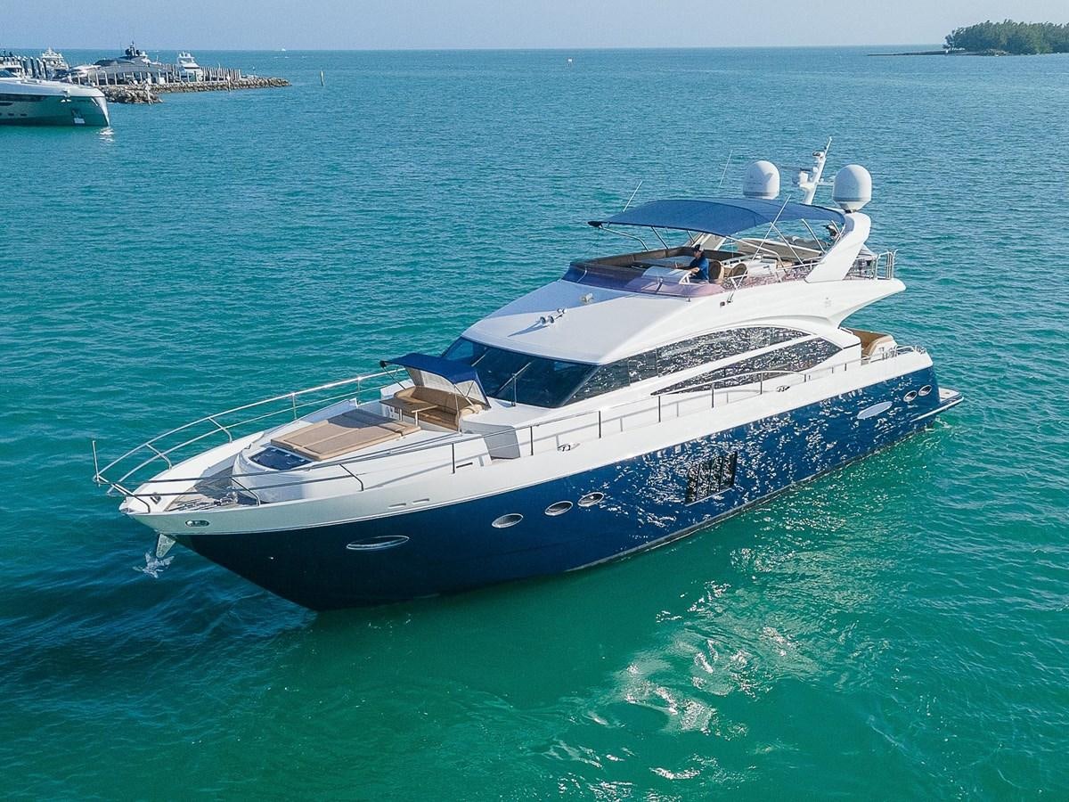 a large white yacht in the water aboard PRINCESS 72 MOTOR YACHT Yacht for Sale