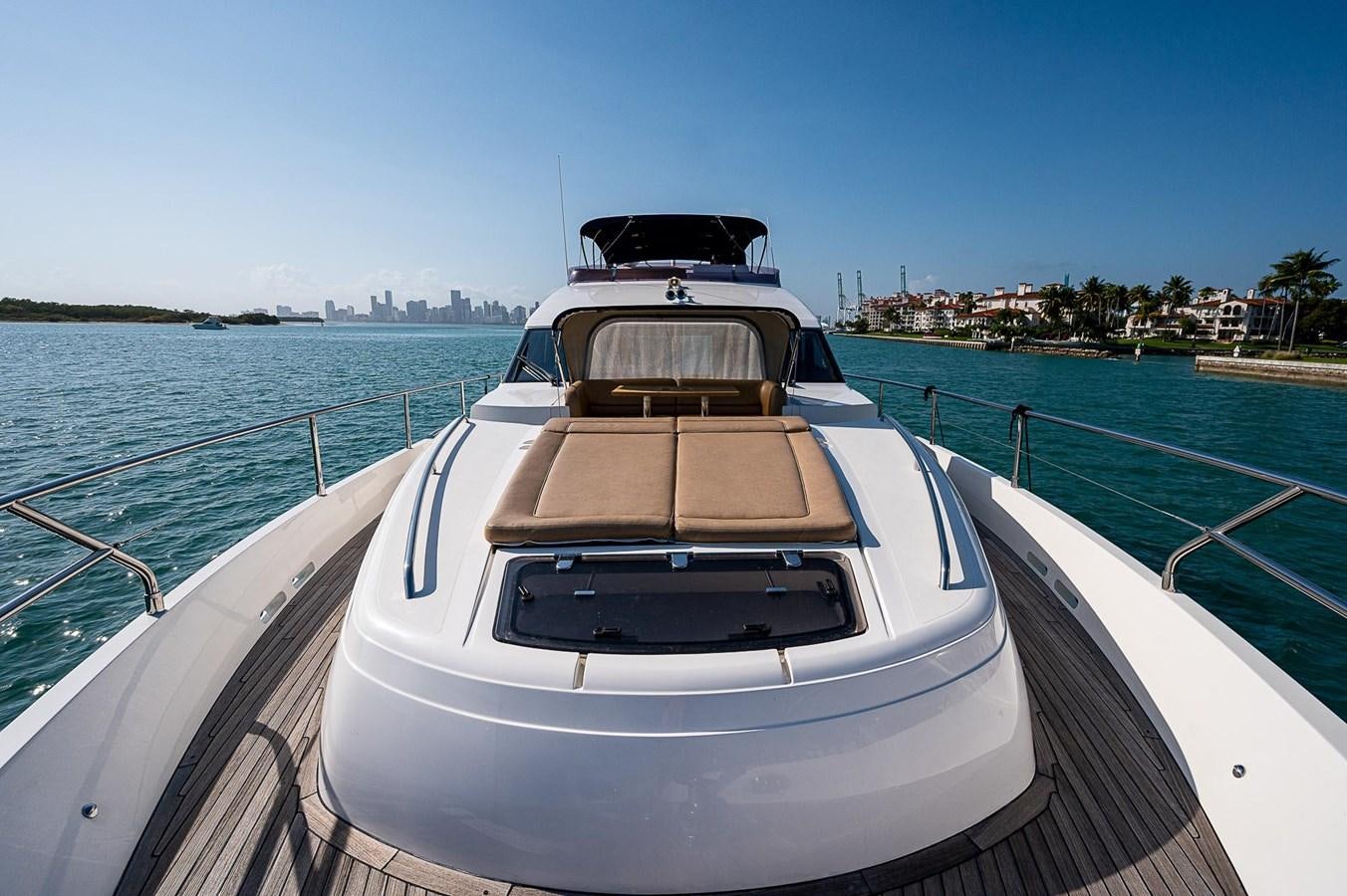a boat on a body of water aboard PRINCESS 72 MOTOR YACHT Yacht for Sale