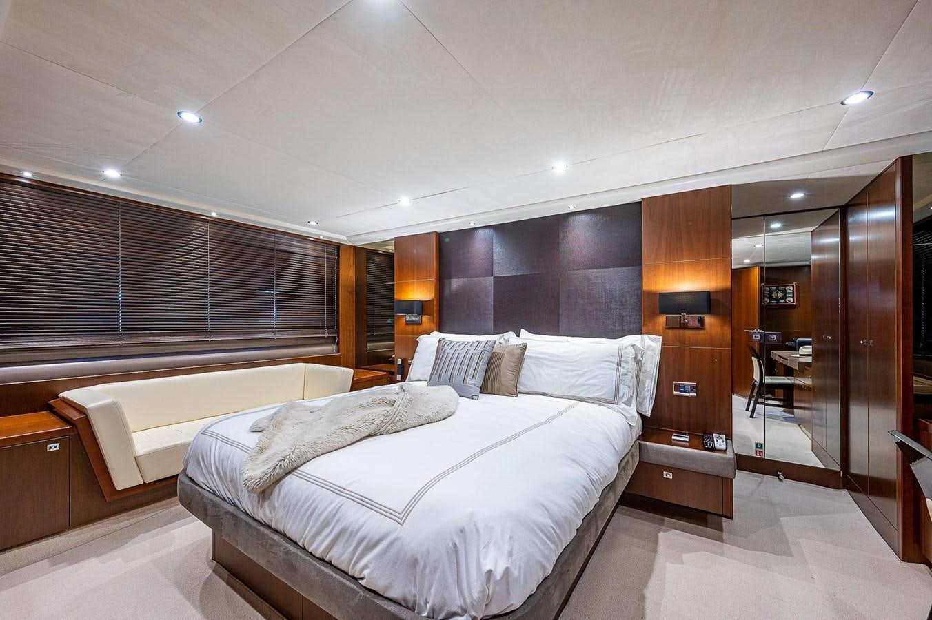 a room with a couple of beds aboard PRINCESS 72 MOTOR YACHT Yacht for Sale