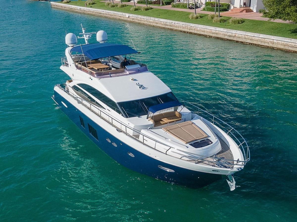 a boat on the water aboard PRINCESS 72 MOTOR YACHT Yacht for Sale
