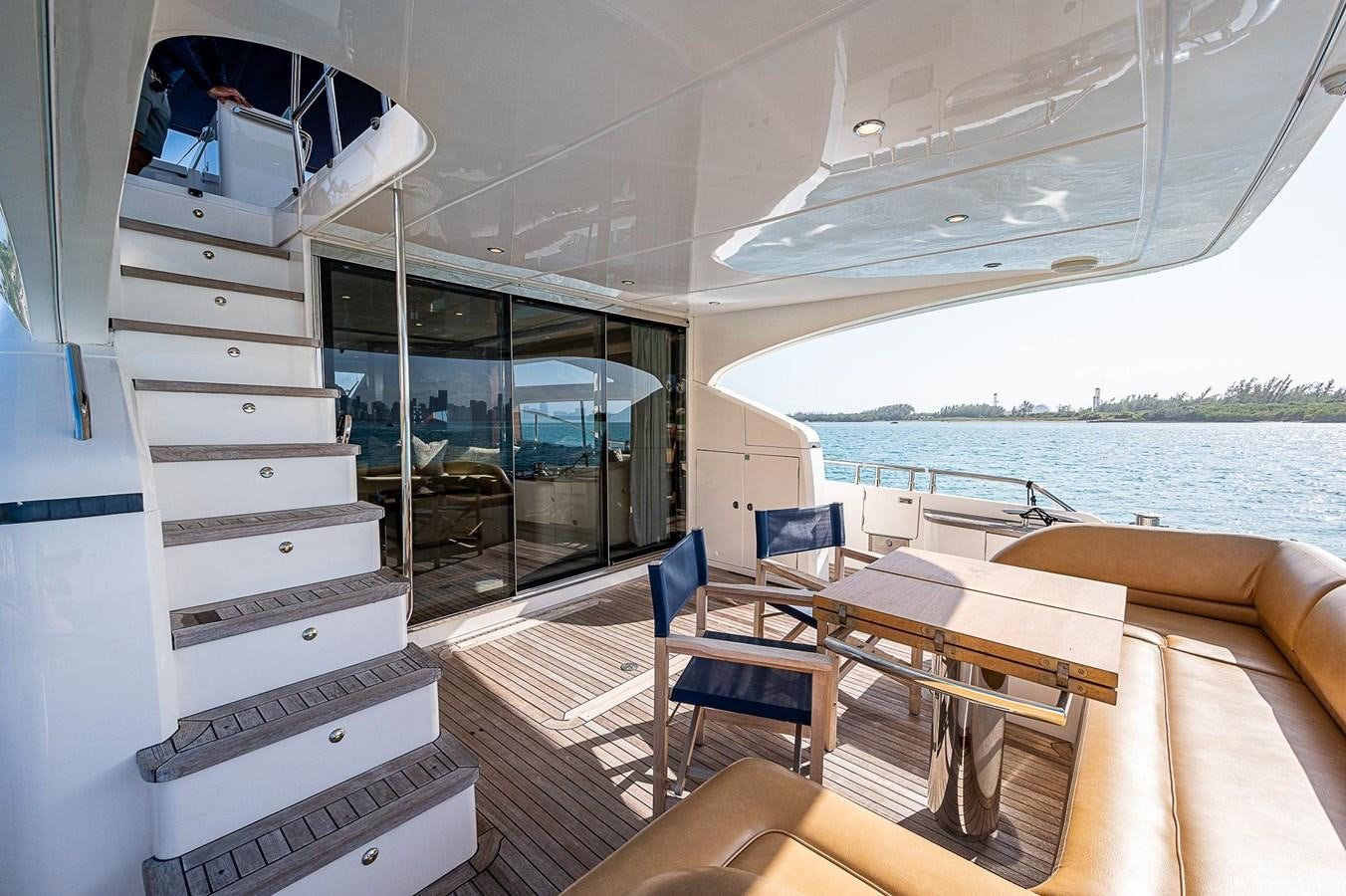 a boat with a large deck aboard PRINCESS 72 MOTOR YACHT Yacht for Sale