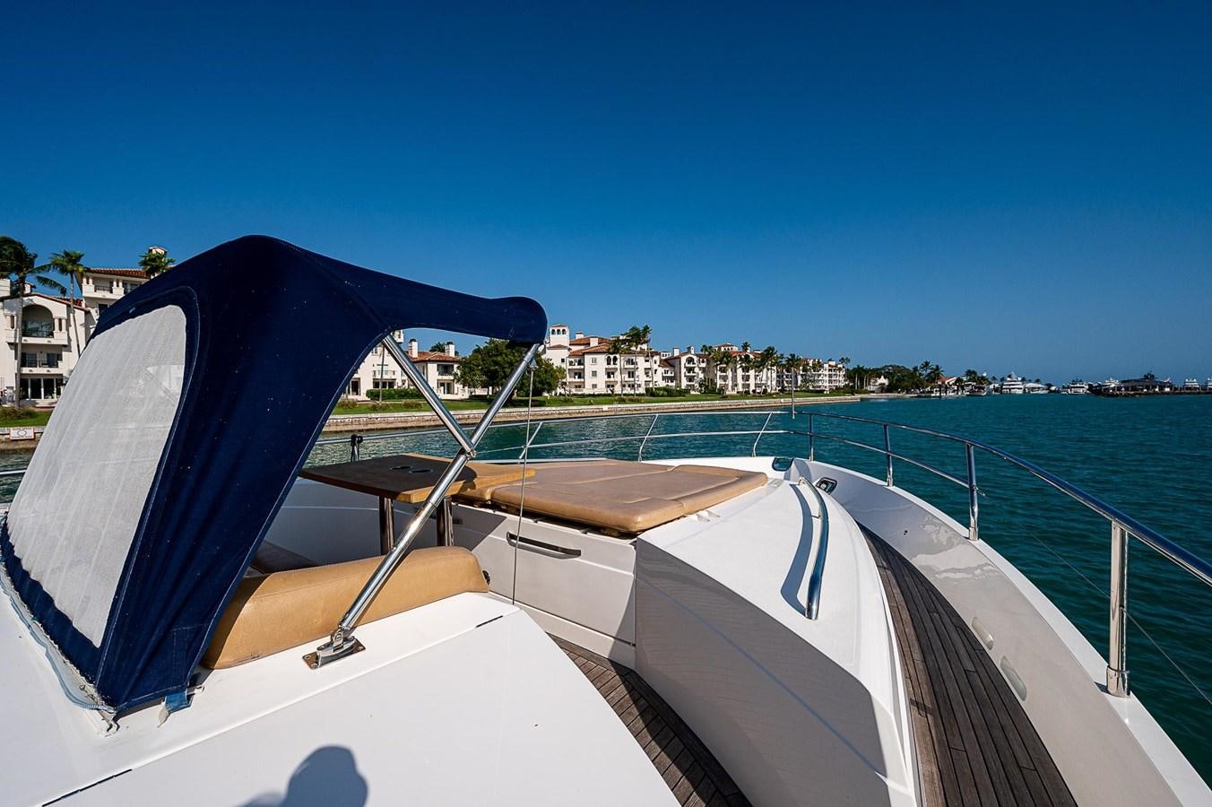 a boat on the water aboard PRINCESS 72 MOTOR YACHT Yacht for Sale