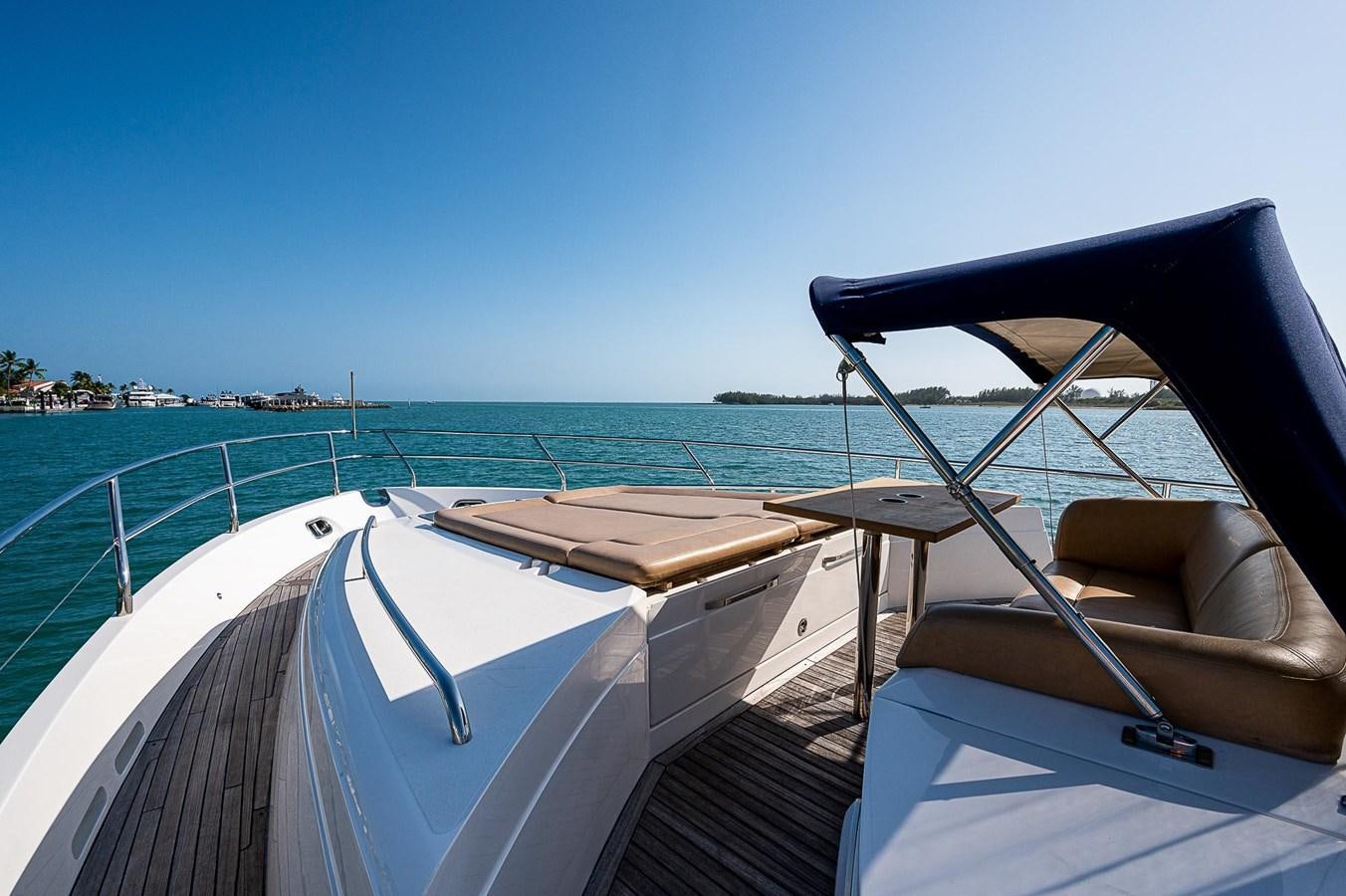 a boat on the water aboard PRINCESS 72 MOTOR YACHT Yacht for Sale