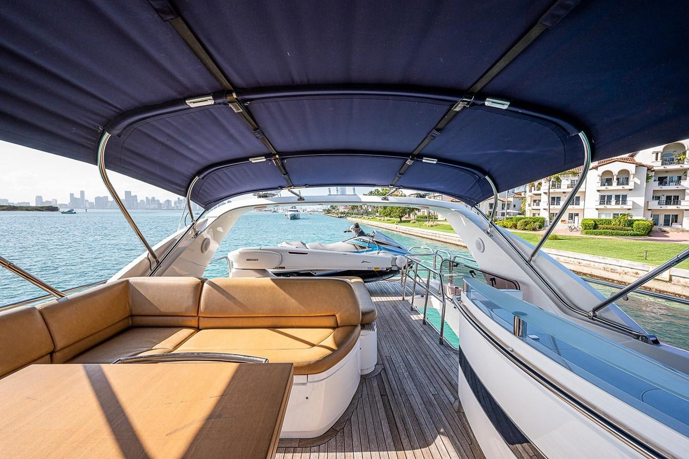 a boat on the water aboard PRINCESS 72 MOTOR YACHT Yacht for Sale