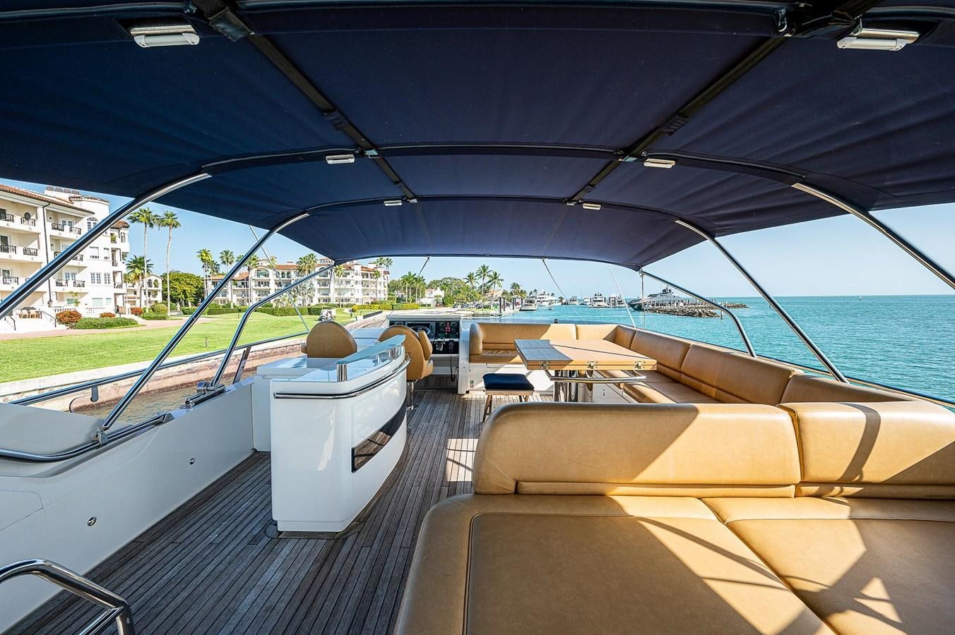 a boat on the water aboard PRINCESS 72 MOTOR YACHT Yacht for Sale