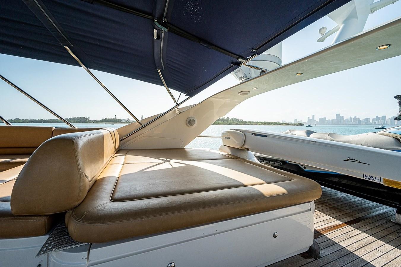 a boat on the water aboard PRINCESS 72 MOTOR YACHT Yacht for Sale