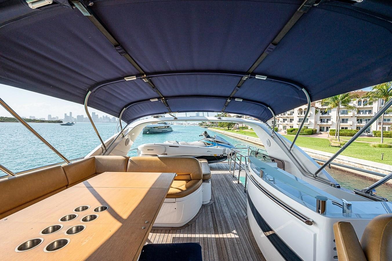 a boat on the water aboard PRINCESS 72 MOTOR YACHT Yacht for Sale