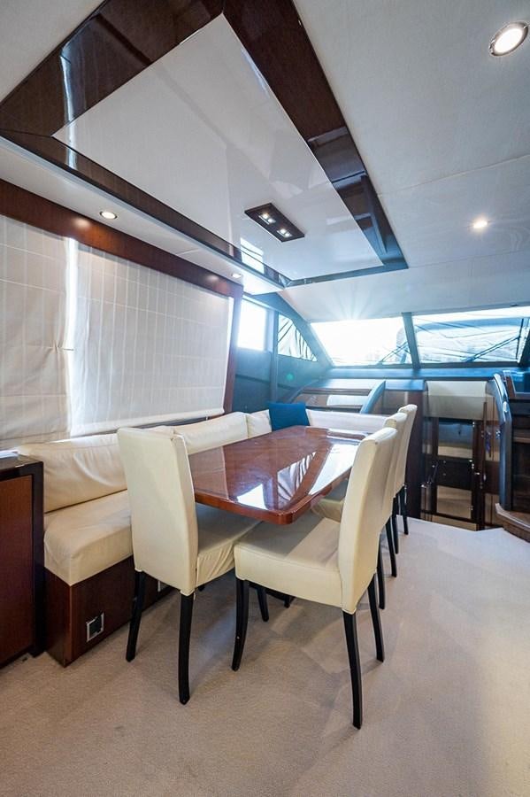 a room with chairs and a table aboard PRINCESS 72 MOTOR YACHT Yacht for Sale