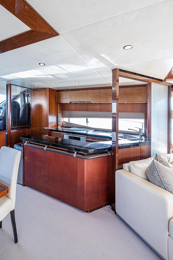 a room with a piano and a couch aboard PRINCESS 72 MOTOR YACHT Yacht for Sale