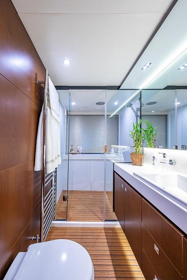 a bathroom with a wood floor aboard PRINCESS 72 MOTOR YACHT Yacht for Sale