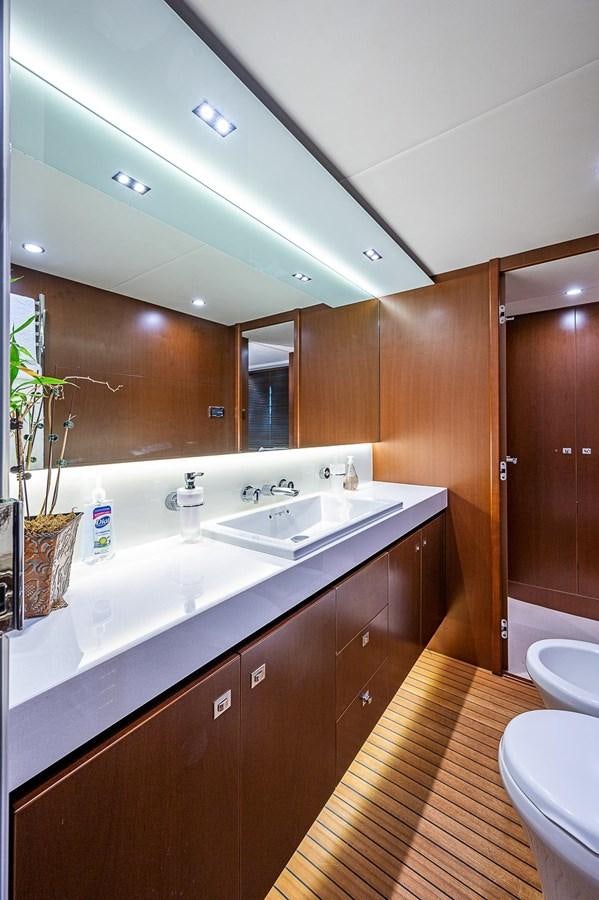 a bathroom with a sink and a mirror aboard PRINCESS 72 MOTOR YACHT Yacht for Sale