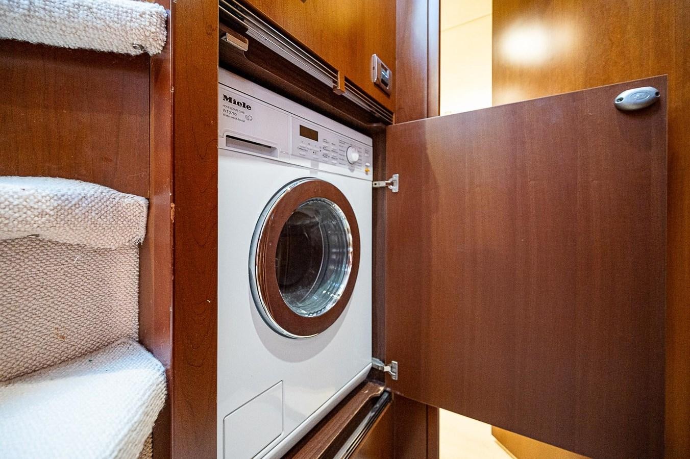 a white washing machine aboard PRINCESS 72 MOTOR YACHT Yacht for Sale