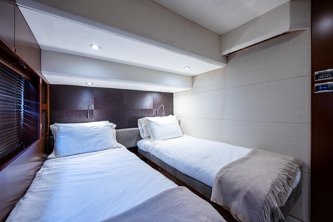 a couple of beds in a room aboard PRINCESS 72 MOTOR YACHT Yacht for Sale