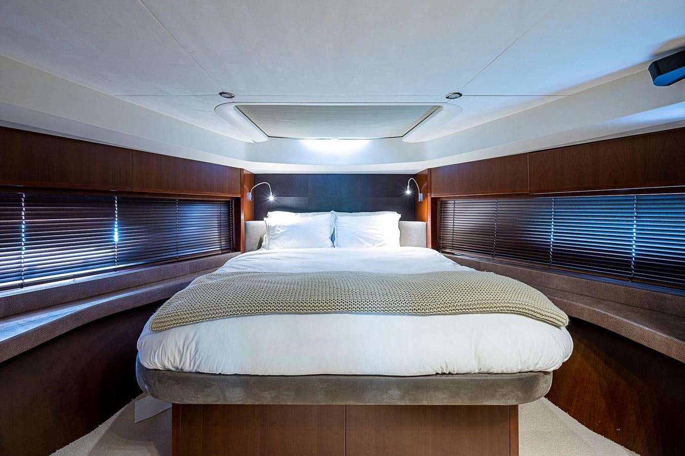 a room with two beds aboard PRINCESS 72 MOTOR YACHT Yacht for Sale