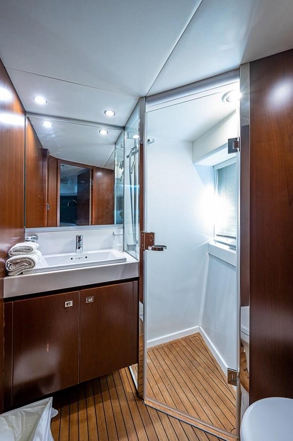 a bathroom with a large mirror aboard PRINCESS 72 MOTOR YACHT Yacht for Sale