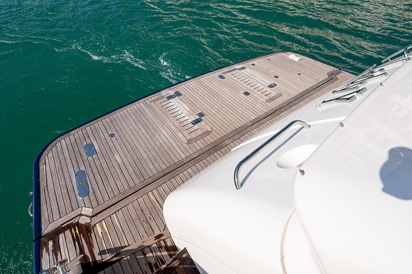 a boat on the water aboard PRINCESS 72 MOTOR YACHT Yacht for Sale