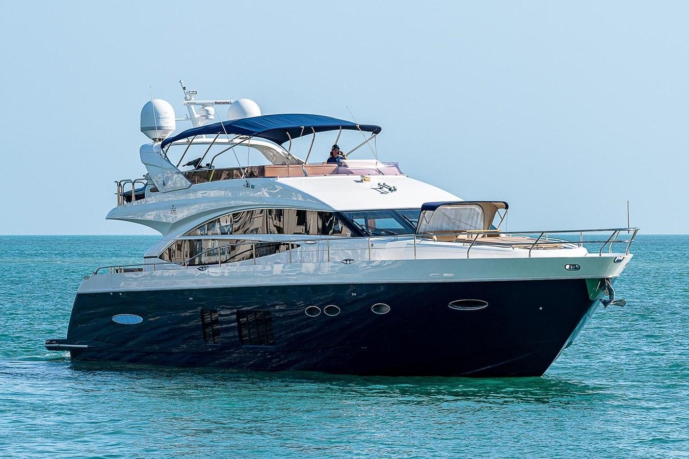 a boat in the water aboard PRINCESS 72 MOTOR YACHT Yacht for Sale