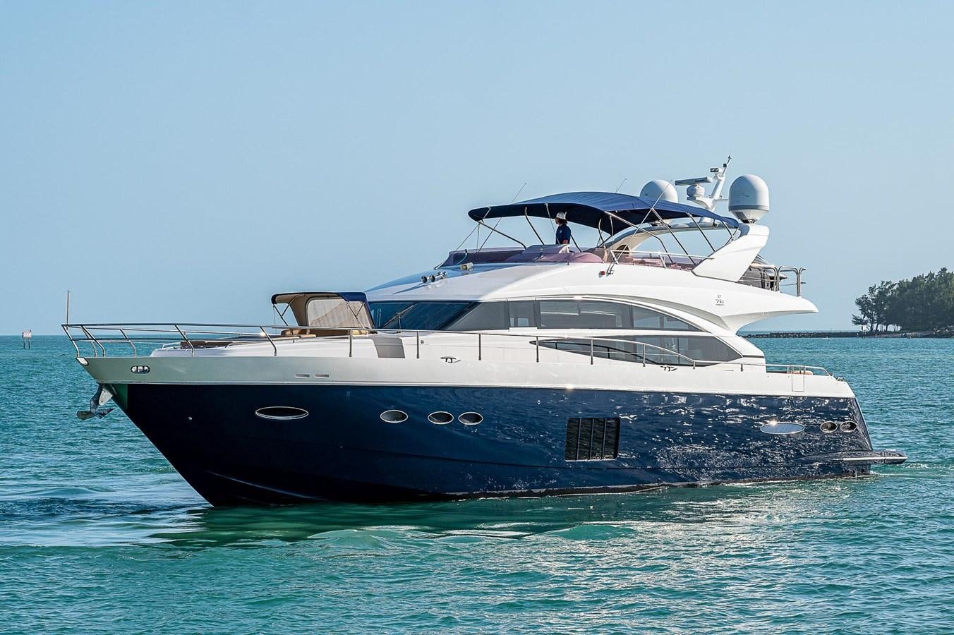 a boat on the water aboard PRINCESS 72 MOTOR YACHT Yacht for Sale