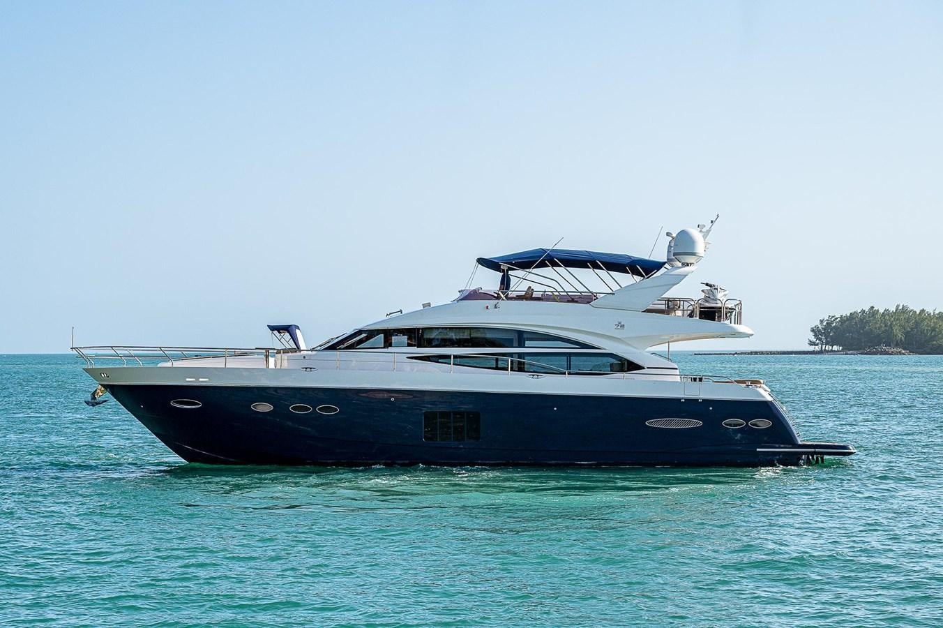 a boat on the water aboard PRINCESS 72 MOTOR YACHT Yacht for Sale