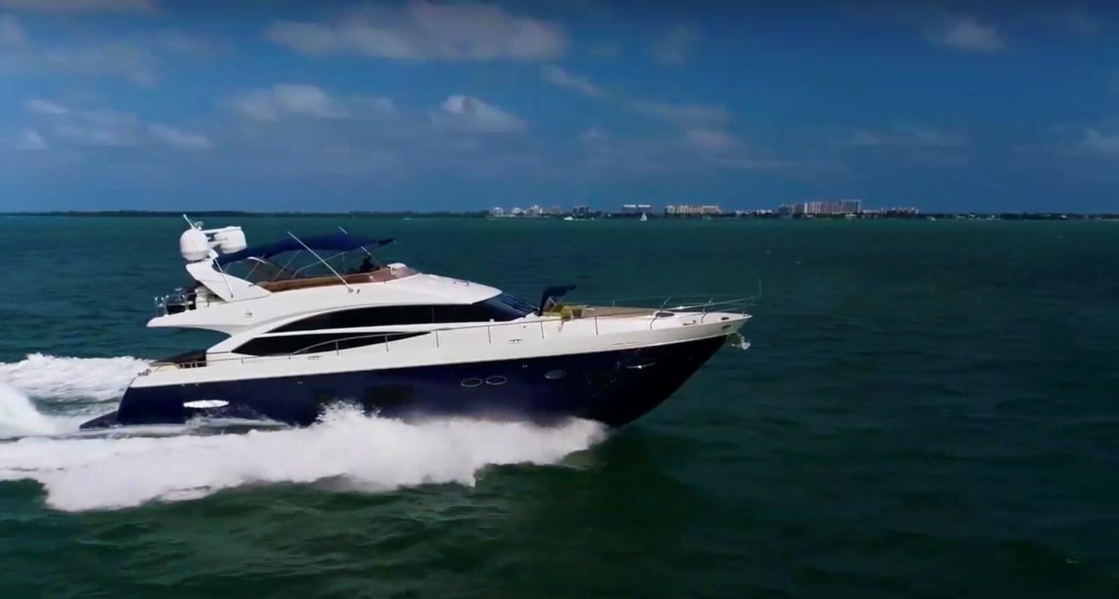 a white yacht on the water aboard PRINCESS 72 MOTOR YACHT Yacht for Sale