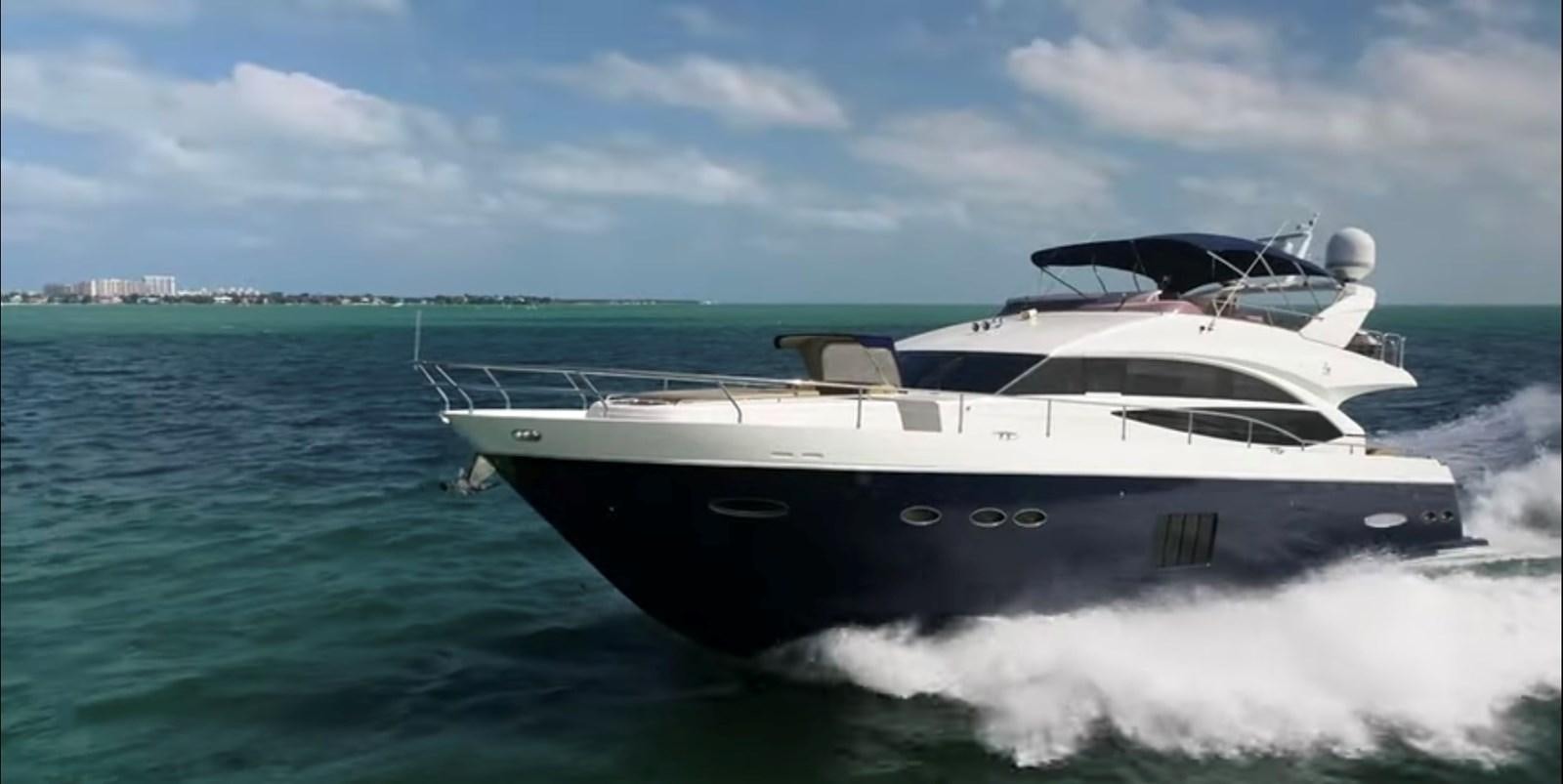 a boat on the water aboard PRINCESS 72 MOTOR YACHT Yacht for Sale