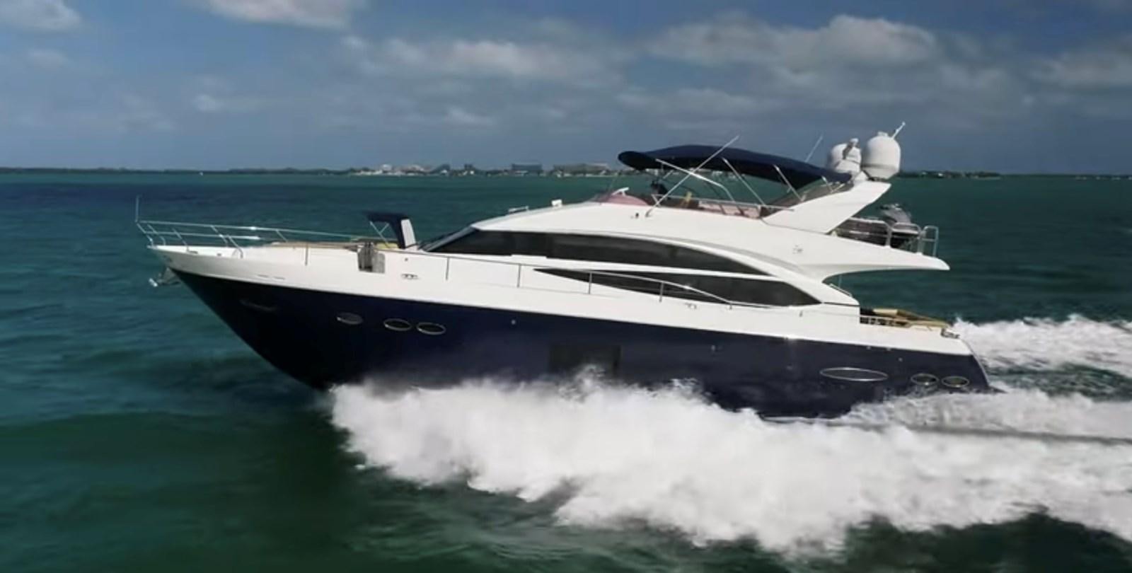 a white yacht on the water aboard PRINCESS 72 MOTOR YACHT Yacht for Sale