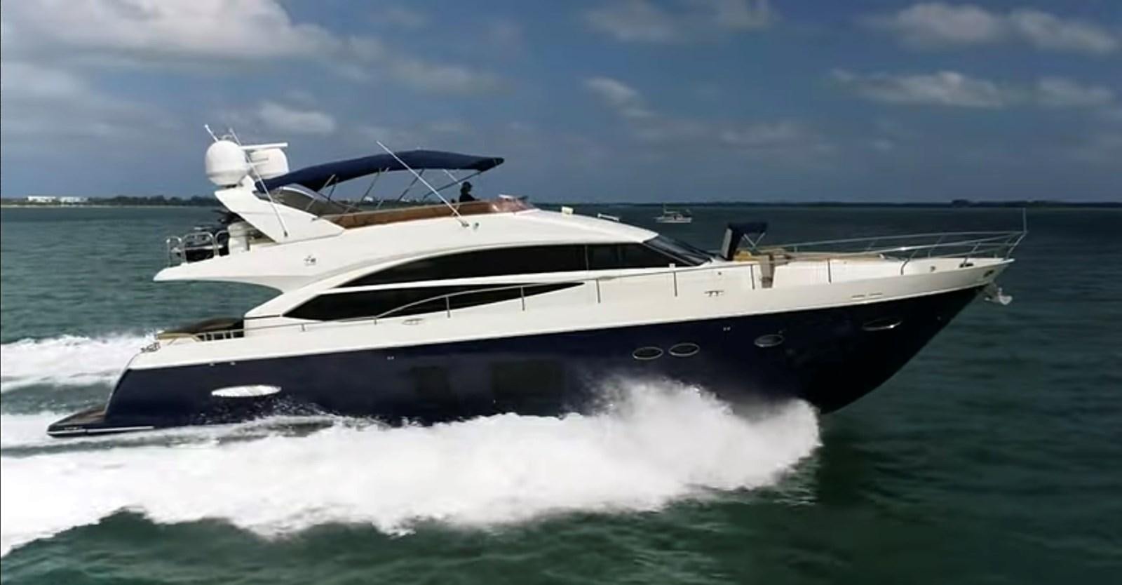 a white yacht on the water aboard PRINCESS 72 MOTOR YACHT Yacht for Sale