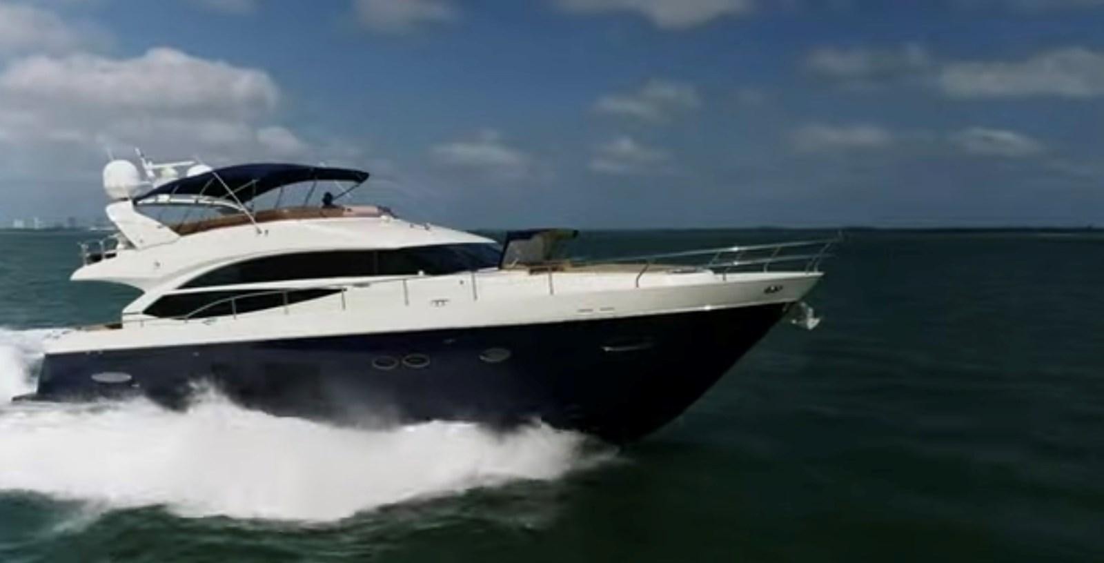 a white yacht on water aboard PRINCESS 72 MOTOR YACHT Yacht for Sale