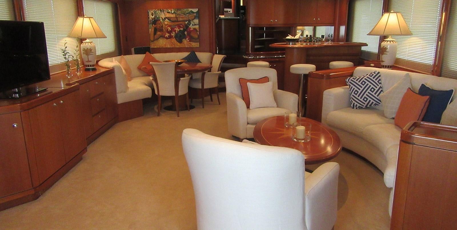 a living room with a couch and a table aboard BLUE PEARL Yacht for Sale