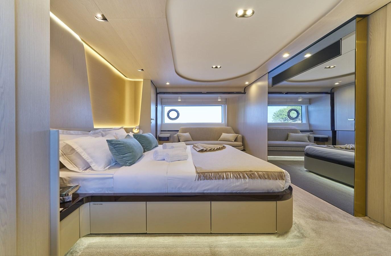 a bed in a room aboard VIVA Yacht for Sale
