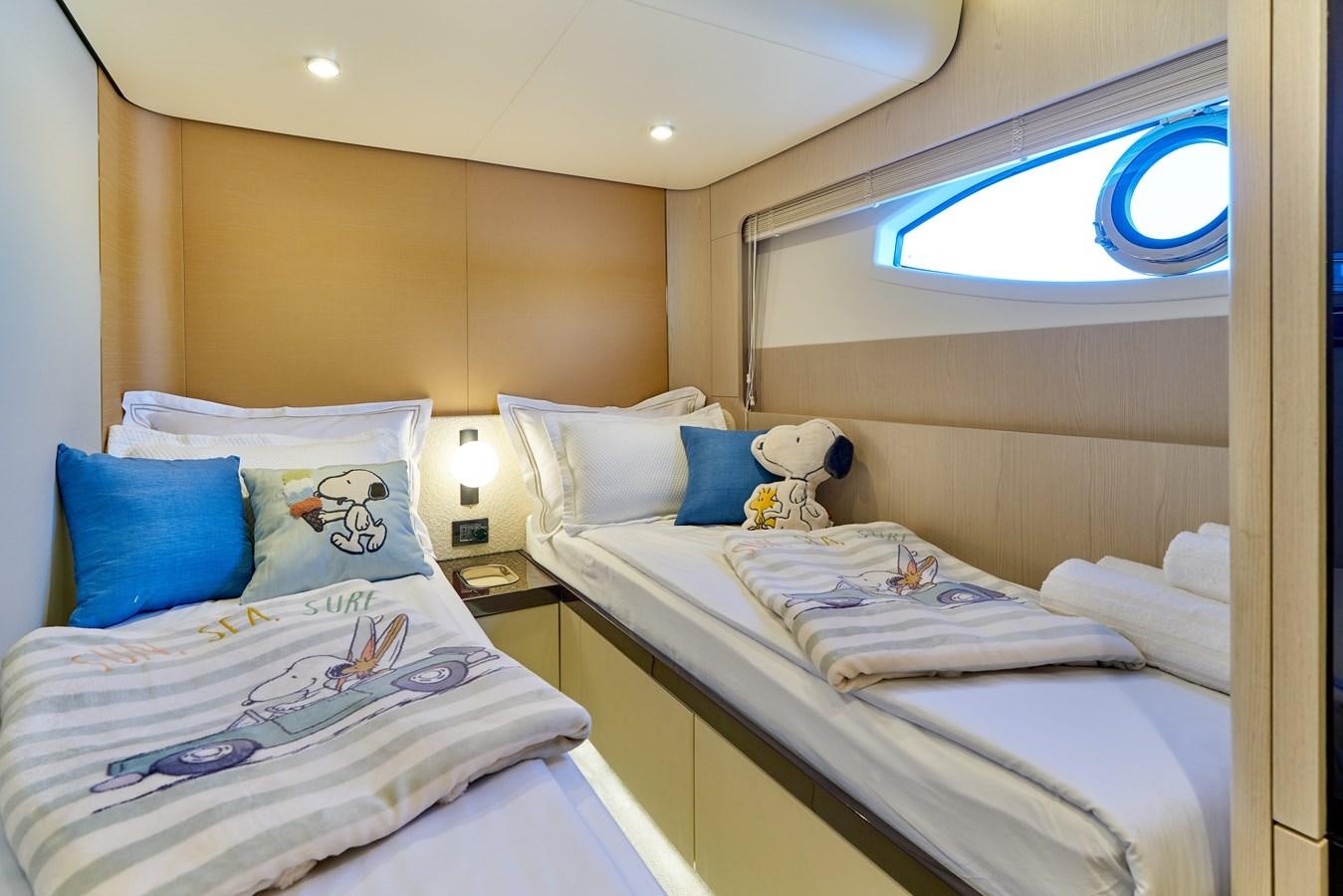 a couple of beds in a hotel room aboard VIVA Yacht for Sale