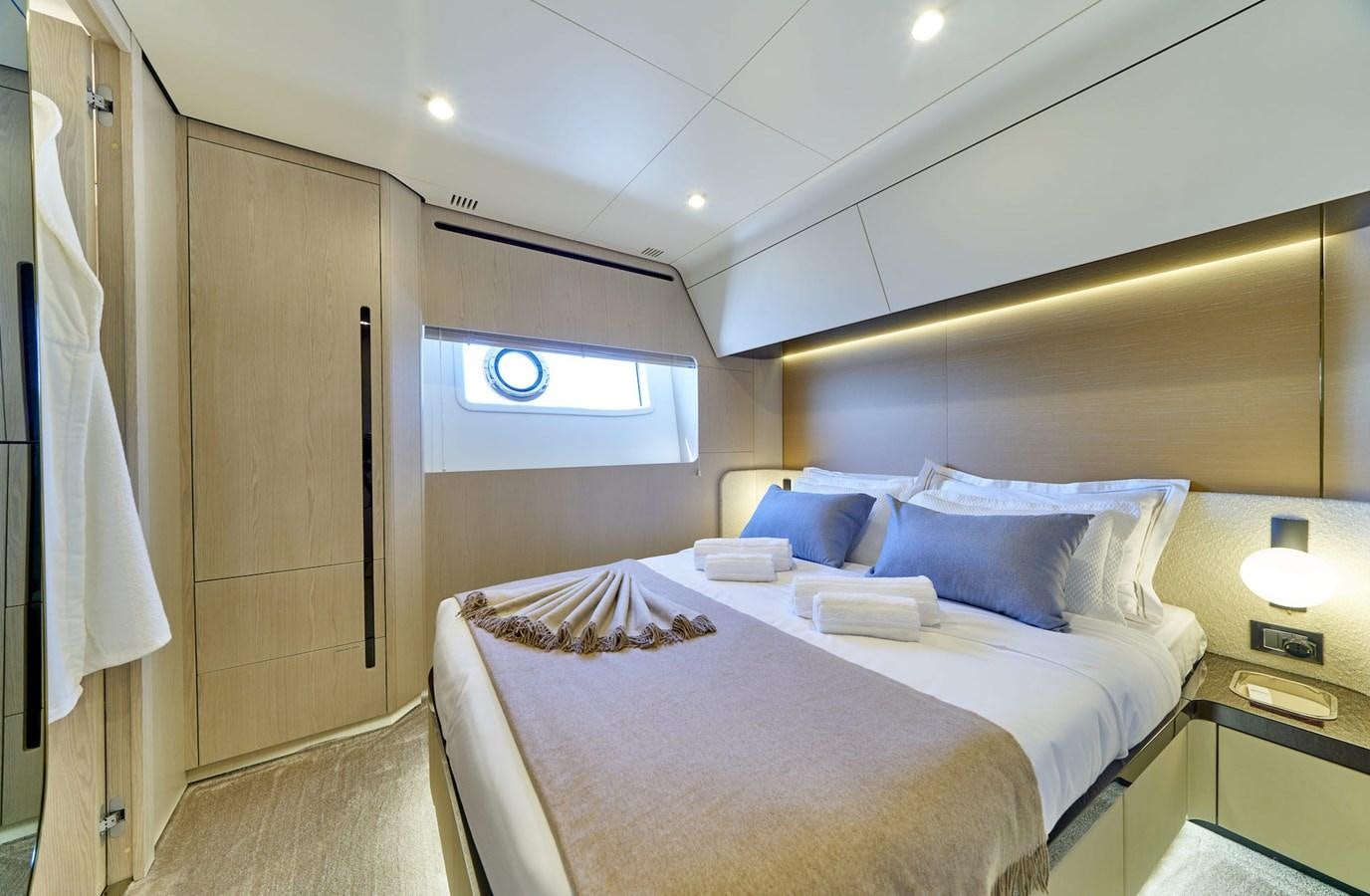 a bed in a room aboard VIVA Yacht for Sale
